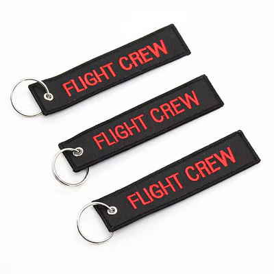 Grosir Olecranon Hook Murah Custom Flight Kain bordir Jet tag Woven Keychain Dengan Logo Anda Sendiri
