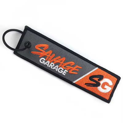 Grosir Olecranon Hook Murah Custom Flight Kain bordir Jet tag Woven Keychain Dengan Logo Anda Sendiri