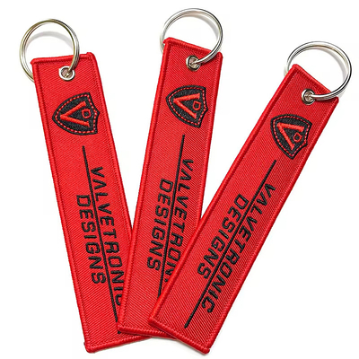 Grosir Olecranon Hook Murah Custom Flight Kain bordir Jet tag Woven Keychain Dengan Logo Anda Sendiri