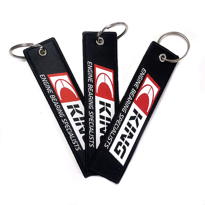Custom Logo Kain bordir tag kunci Woven Logo Sebelum Penerbangan Jet Tag Keychain Sebagai hadiah