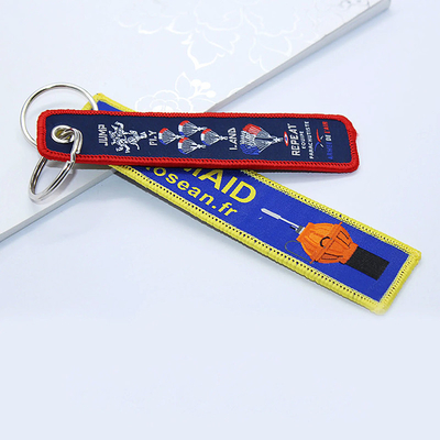 Polyester Keyring Disesuaikan bordir Jet Tag Kain Woven Keychain dengan Logo Anda